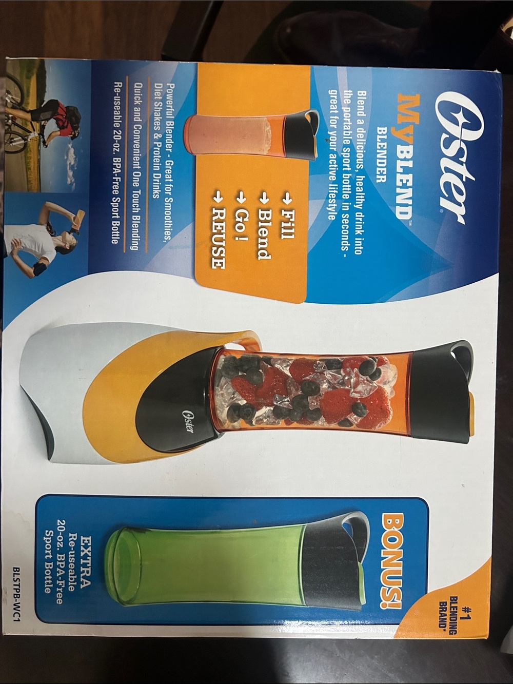 Oster Personal Blender in Orange and Black with Bonus Green Bottle